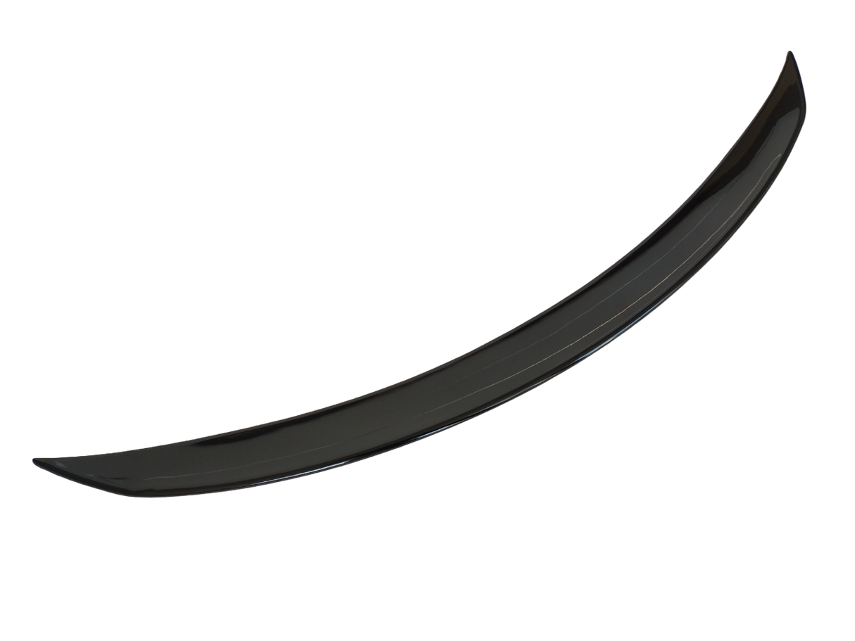 A curved, glossy black car spoiler is isolated on a white background, showcasing its aerodynamic design.