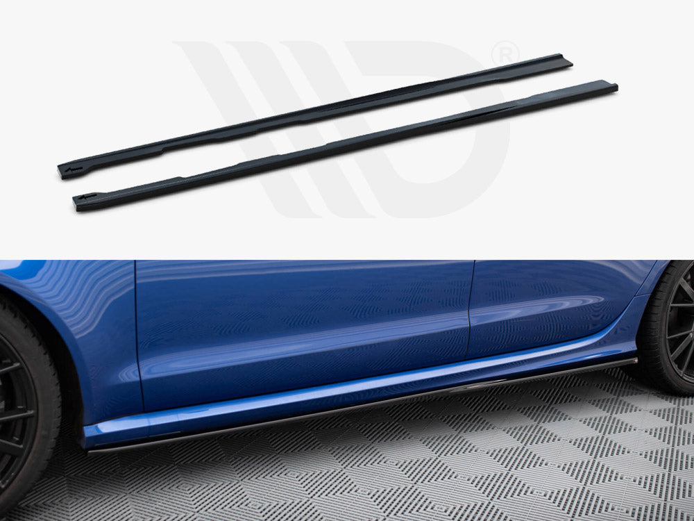 Two black side skirts sit above an image of a blue car's side with a fitted side skirt, on a textured gray floor.