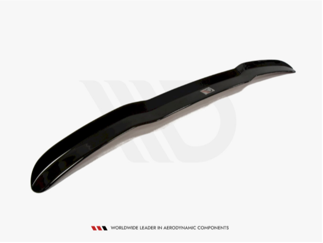 A sleek black car spoiler rests on a white background, emphasizing its aerodynamic design. Text below reads, "WORLDWIDE LEADER IN AERODYNAMIC COMPONENTS."