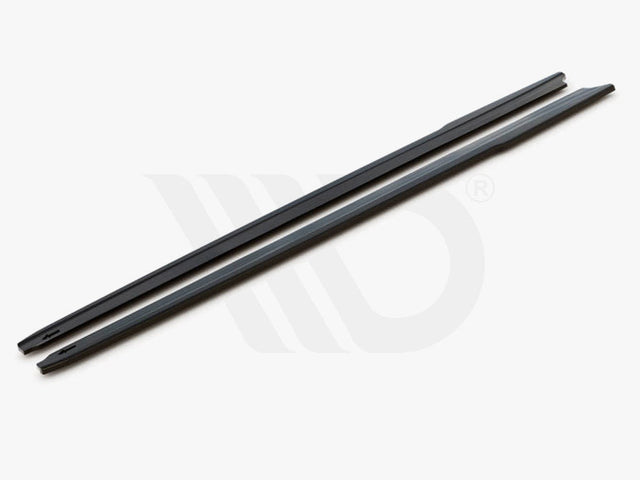 Two long, slim black bars rest parallel on a white surface. Text reads: "WORLDWIDE LEADER IN AERODYNAMIC COMPONENTS."