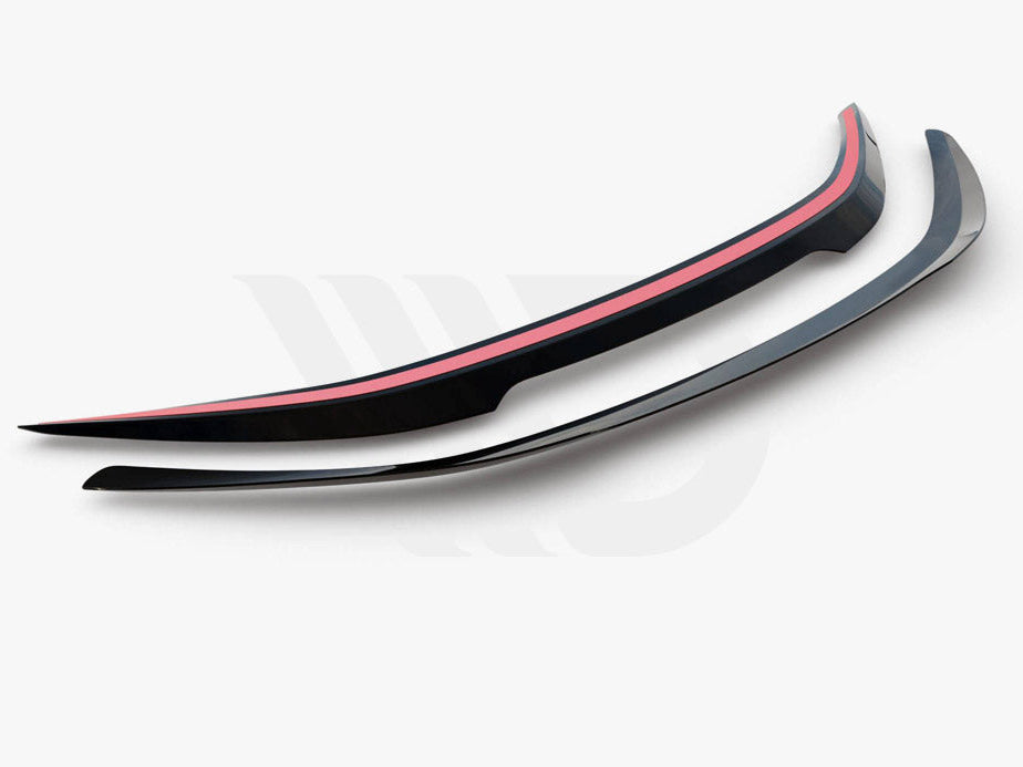Two sleek, curved aerodynamic car spoilers are placed side by side on a white background. The upper spoiler features a red stripe. Bottom text reads: "WORLDWIDE LEADER IN AERODYNAMIC COMPONENTS."