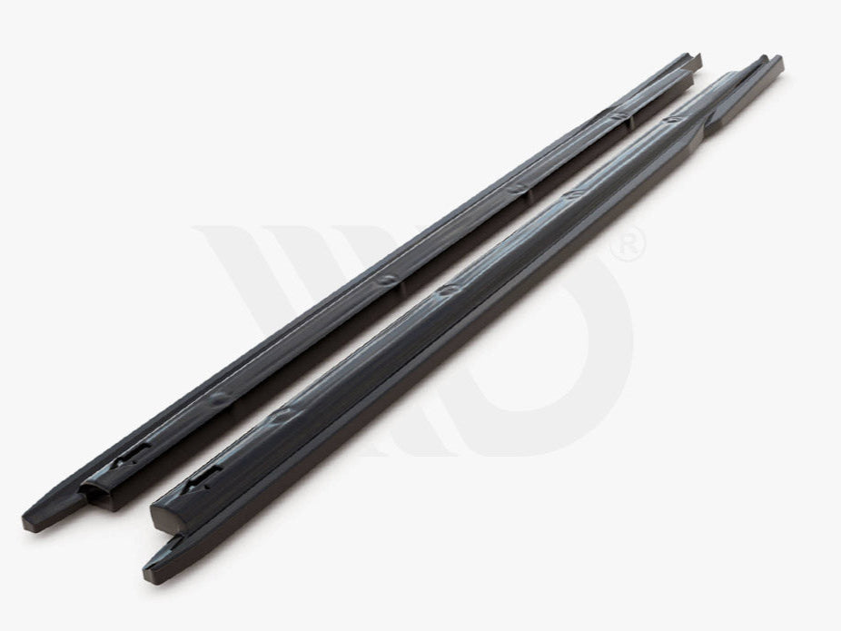 Two black, elongated plastic strips lie parallel on a white surface, likely used for aerodynamic purposes. Text below reads, "WORLDWIDE LEADER IN AERODYNAMIC COMPONENTS."