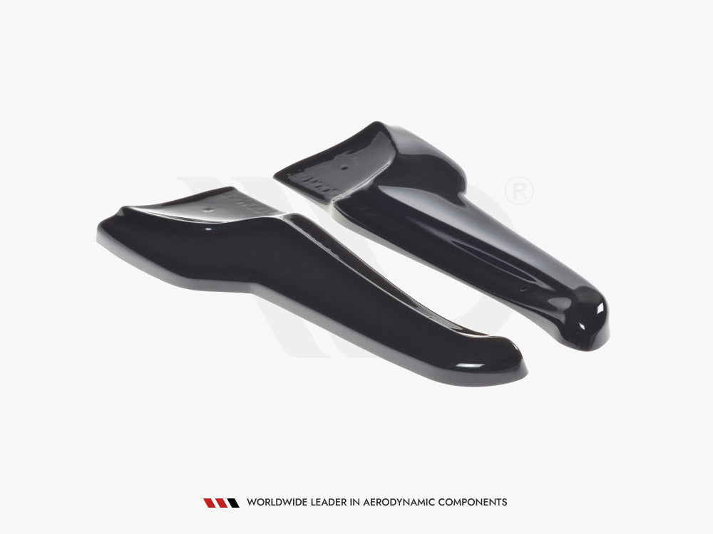 Two glossy black aerodynamic components are positioned side by side on a white background. Text at the bottom reads: "WORLDWIDE LEADER IN AERODYNAMIC COMPONENTS."