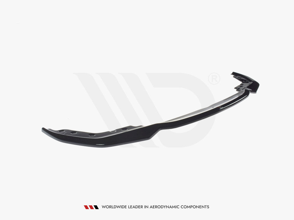 A sleek, black aerodynamic car spoiler lies on a plain white background. Text reads: "WORLDWIDE LEADER IN AERODYNAMIC COMPONENTS."