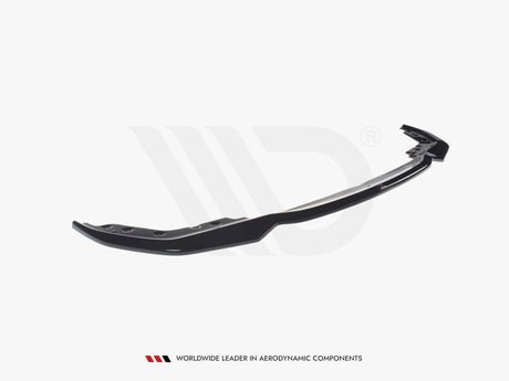 A sleek, black aerodynamic car spoiler lies on a plain white background. Text reads: "WORLDWIDE LEADER IN AERODYNAMIC COMPONENTS."