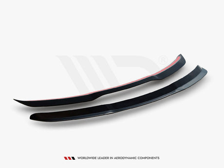 Two black aerodynamic car components rest on a white background, showcasing their sleek, curved design. Text below reads: "WORLDWIDE LEADER IN AERODYNAMIC COMPONENTS."