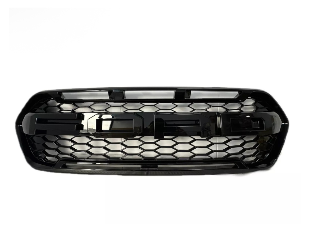 A black vehicle grille features bold lettering spelling "FORD" with a hexagonal mesh pattern, set against a plain white background.