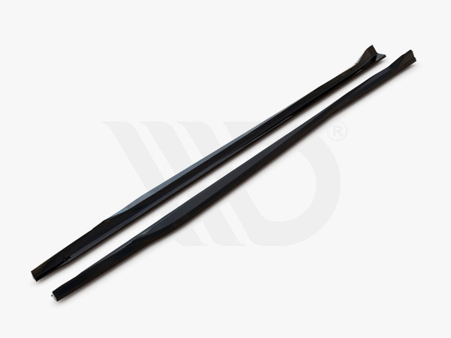 Two long, black aerodynamic components lie parallel on a white surface, with text, "WORLDWIDE LEADER IN AERODYNAMIC COMPONENTS," displayed underneath.