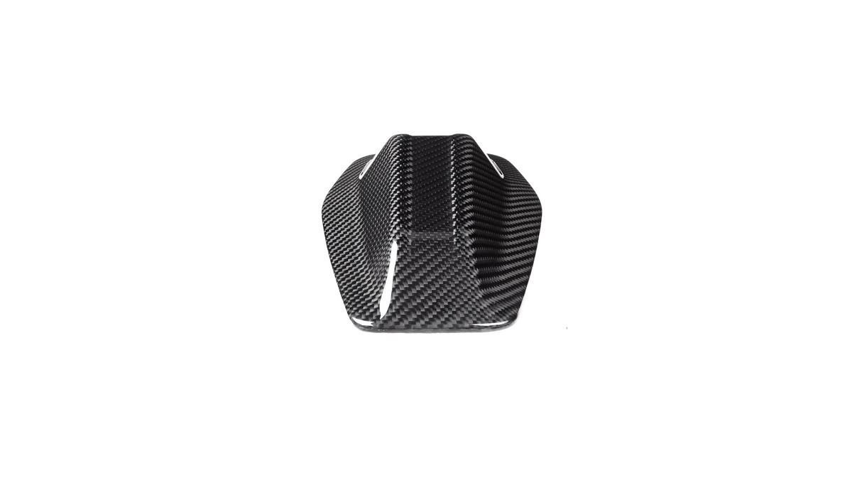 A sleek, black carbon fiber object with a streamlined, angular shape sits against a plain white background, suggesting a component for a vehicle or machinery.