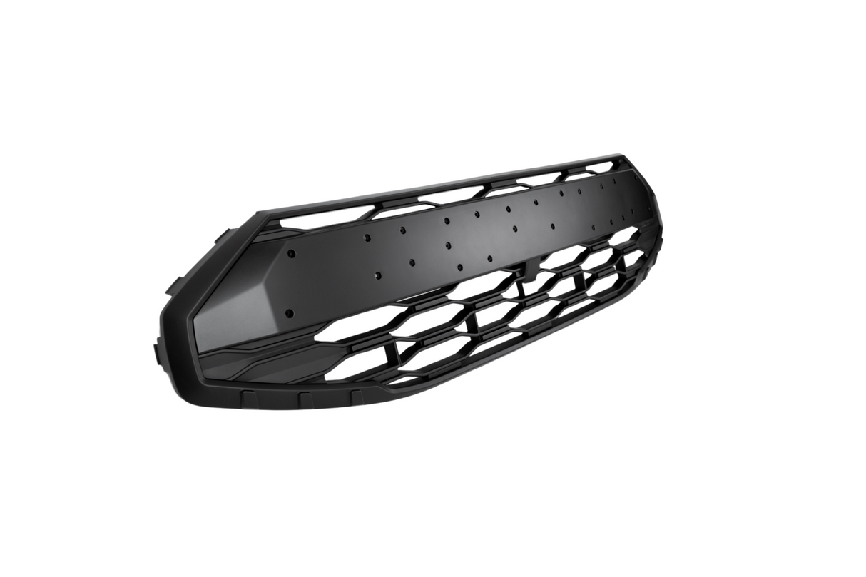 A black, hexagonal-patterned automotive grille is displayed against a white background, showcasing its sleek, angular design with detailing and bolt holes.