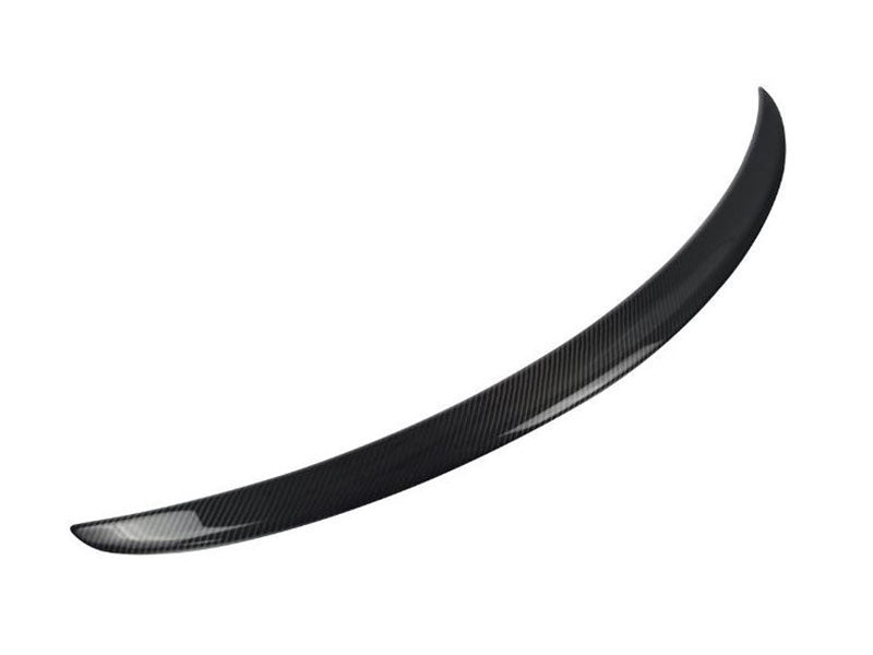 A curved, black carbon fiber car spoiler is displayed, isolated against a plain white background, emphasizing its smooth, aerodynamic design.