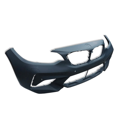 A black car bumper with angular contours and a central grille cutout, placed against a plain white background.