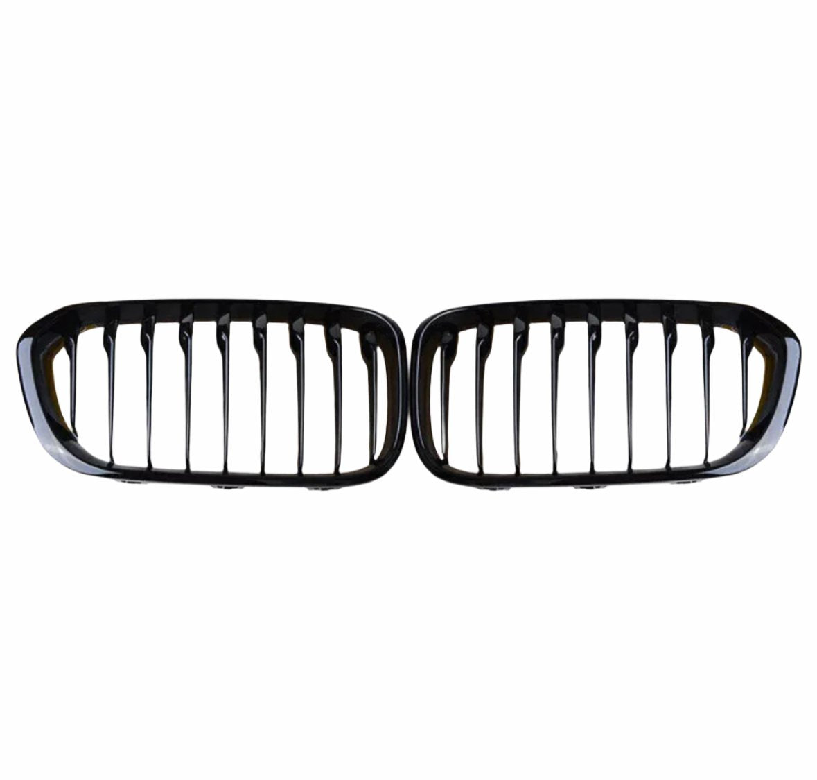 A pair of black, horizontally aligned kidney-shaped car grilles with vertical slats, set against a plain white background.
