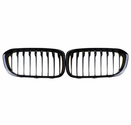 A pair of black, horizontally aligned kidney-shaped car grilles with vertical slats, set against a plain white background.