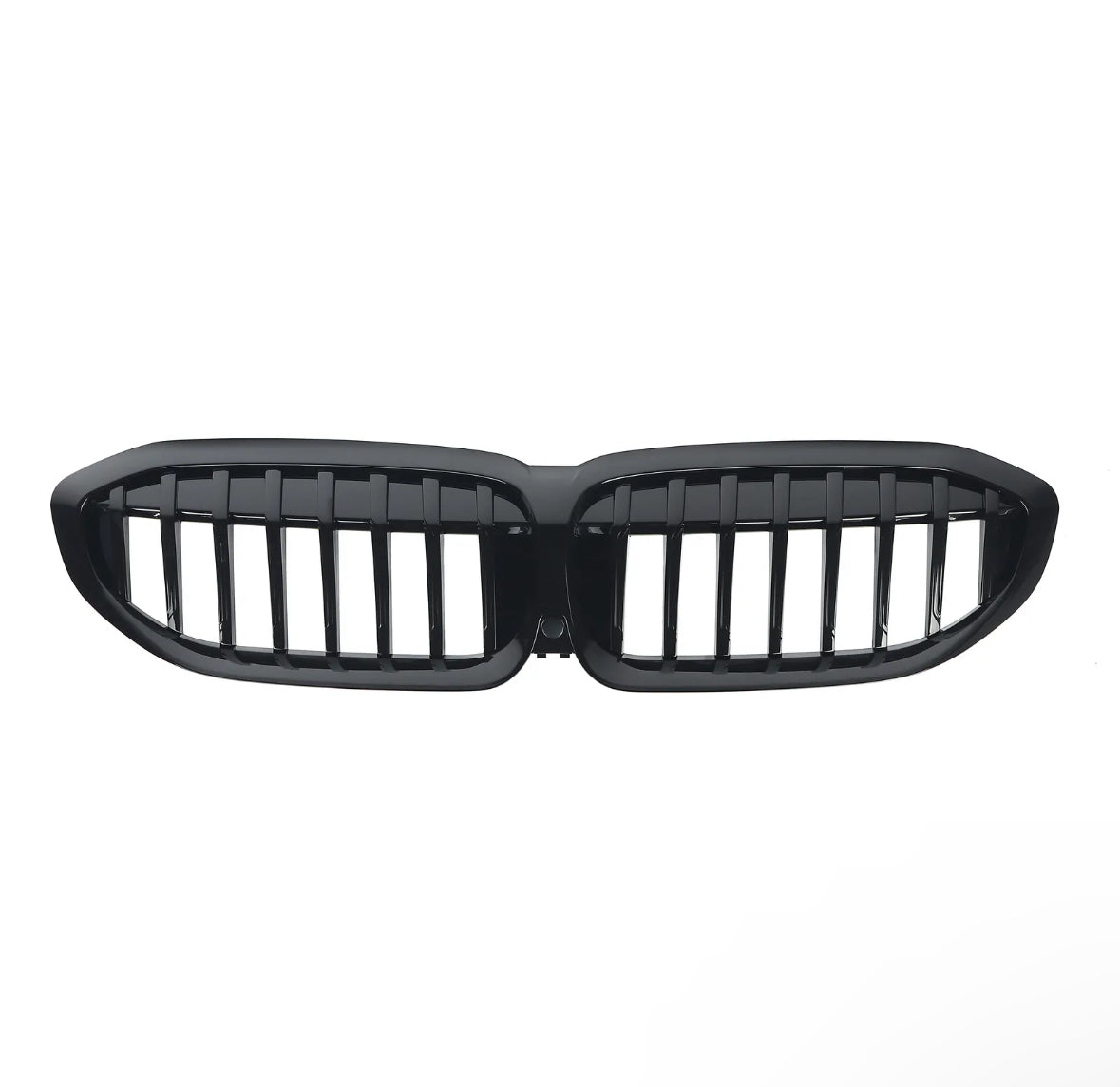 A glossy black car grille with vertical slats, shaped in two connected oval sections, is isolated on a white background.