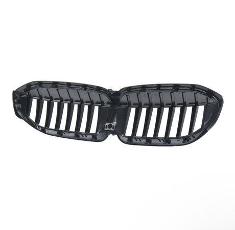 A glossy black automotive grille with vertical slats is centered against a plain white background, resembling a kidney shape, commonly used in car fronts for air intake.