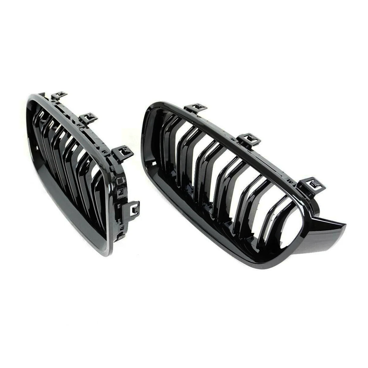 Two glossy black car grilles featuring vertical slats are positioned side by side on a plain white background, showcasing their shiny surface and attachment clips.