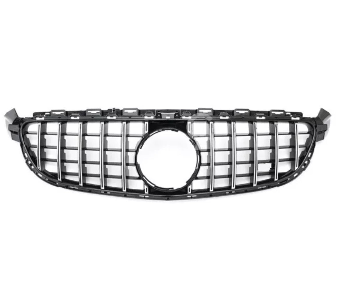 Car grille with vertical chrome slats and a central circular emblem space; displayed against a plain white background.