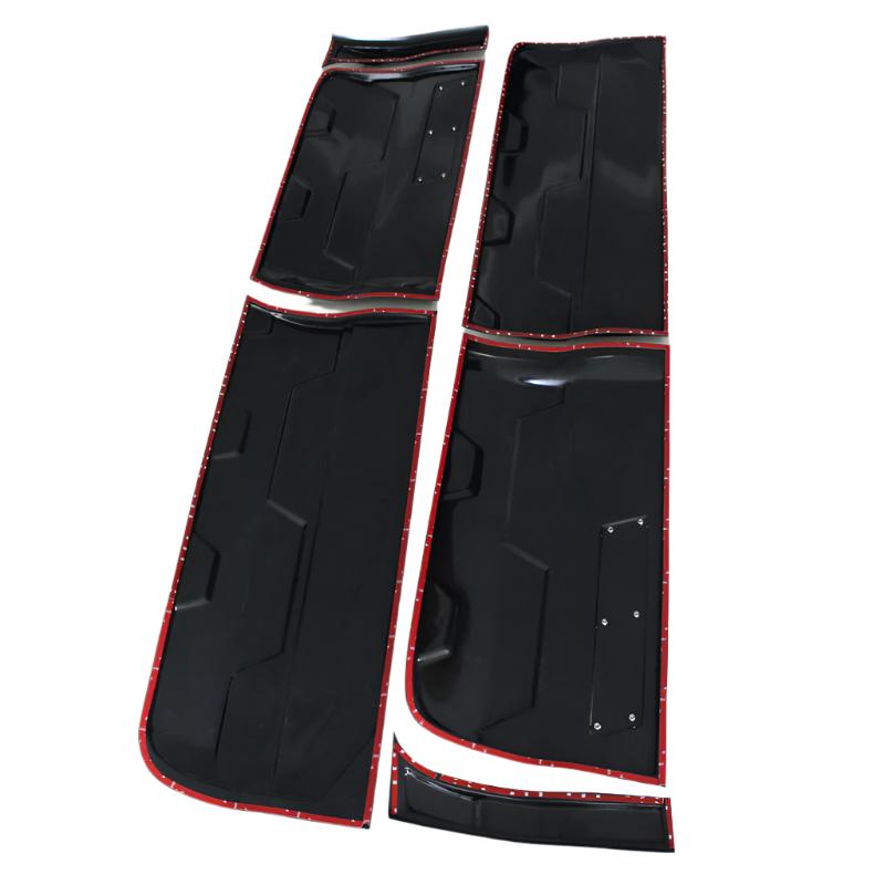Four black car body panels with a red trim are laid out on a white background. The panels have slightly curved edges and visible screws, suggesting they are ready for installation.