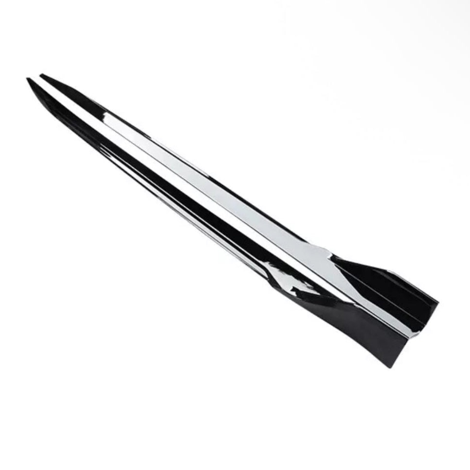 A sleek, stainless steel kitchen tong is positioned open against a plain white background, designed for gripping and lifting foods efficiently.