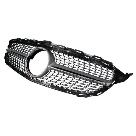 A black car grille features a honeycomb pattern with a circular opening in the center. It is isolated against a plain white background.