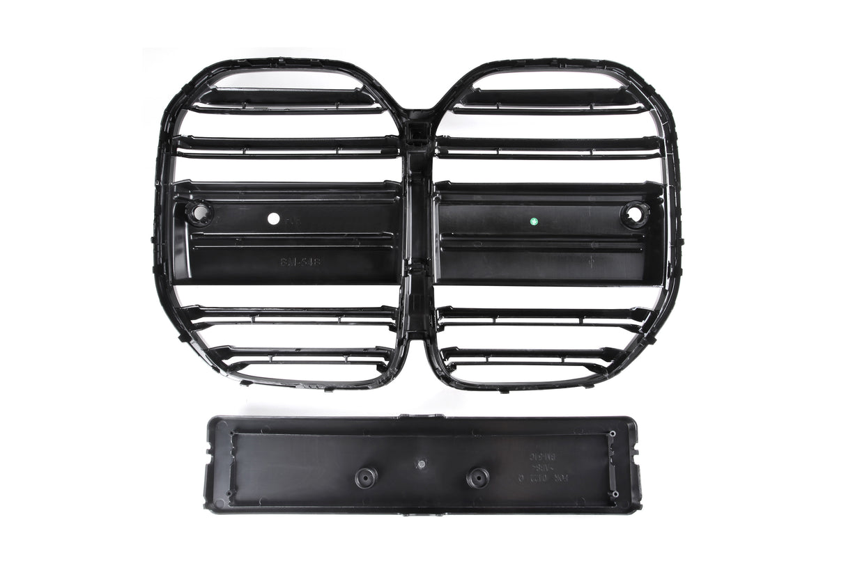 Black vehicle grill with horizontal slats and a rectangular mounting area below, set against a plain white background. Text reads “FK,” “BMW5,” and “FOR OE# 51117266199.”