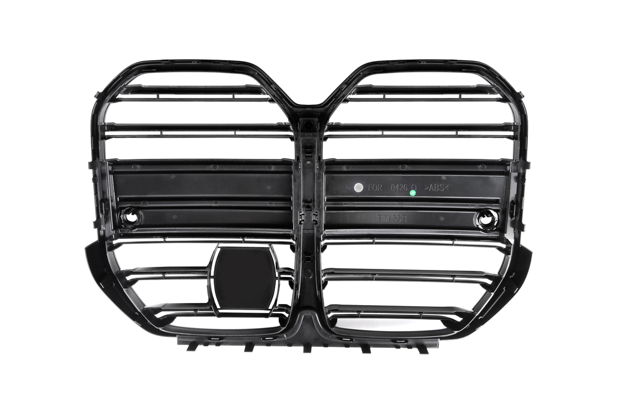 Black vehicle grille with horizontal slats, forming two connected, rounded sections. Molded text on one slat reads "FOR 0426 >ABS< BM 555." Set against a white background.