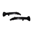 Two black, curved plastic car parts with attachment points rest against a white background, likely designed for vehicle installation or modification.