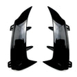 Two glossy black car bumper fins are facing each other, designed to be attached via clips. They are positioned on a plain white background.