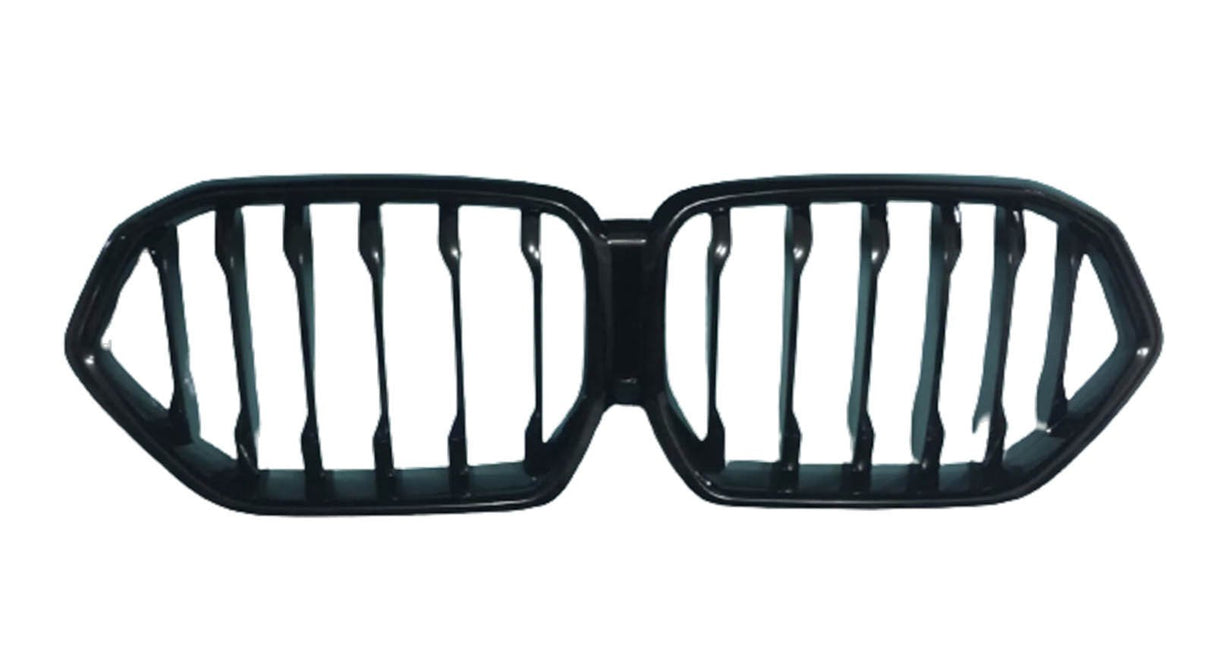 A black automotive grille with a dual-kidney shape, featuring vertical slats. It is isolated on a white background, suggesting it's a part removed for display.