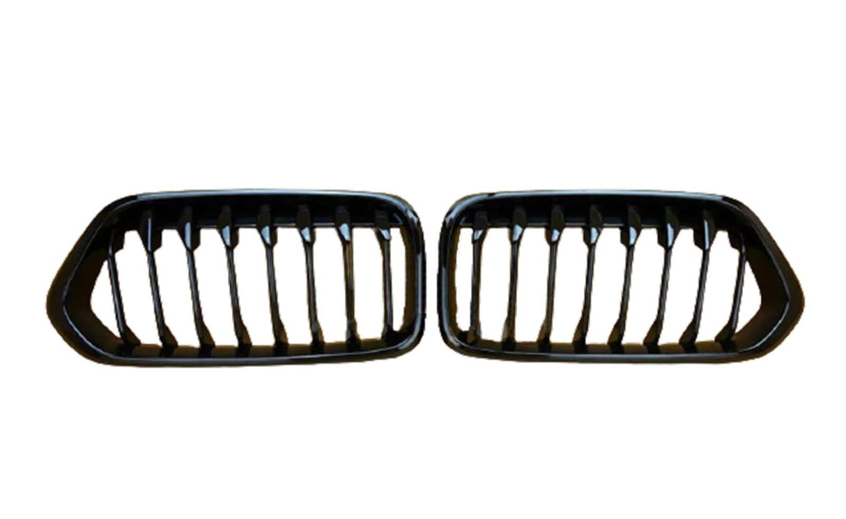 Two black car grilles with vertical slats are displayed side by side against a plain white background.