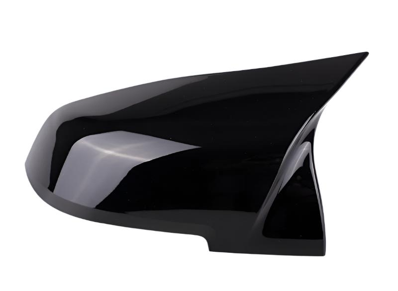 A sleek, black car side mirror cover with a glossy finish, viewed from the side, isolated on a white background.