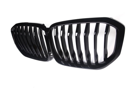A black grille with vertical slats is positioned side-by-side, designed for a vehicle's front. It is set against a plain white background, emphasizing its shiny finish.