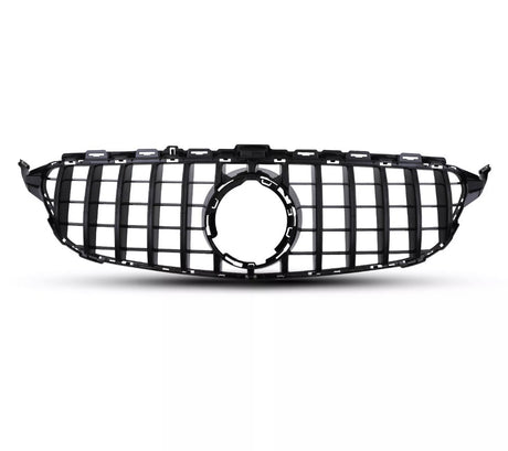 A black car grille with vertical and horizontal slats is positioned against a plain white background, featuring a central circular emblem space, suggesting automotive design.