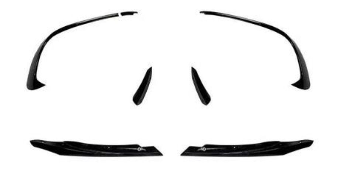 Black, glossy car spoilers and side skirts are arranged symmetrically on a white background, suggesting their use for a vehicle's aerodynamic enhancement.