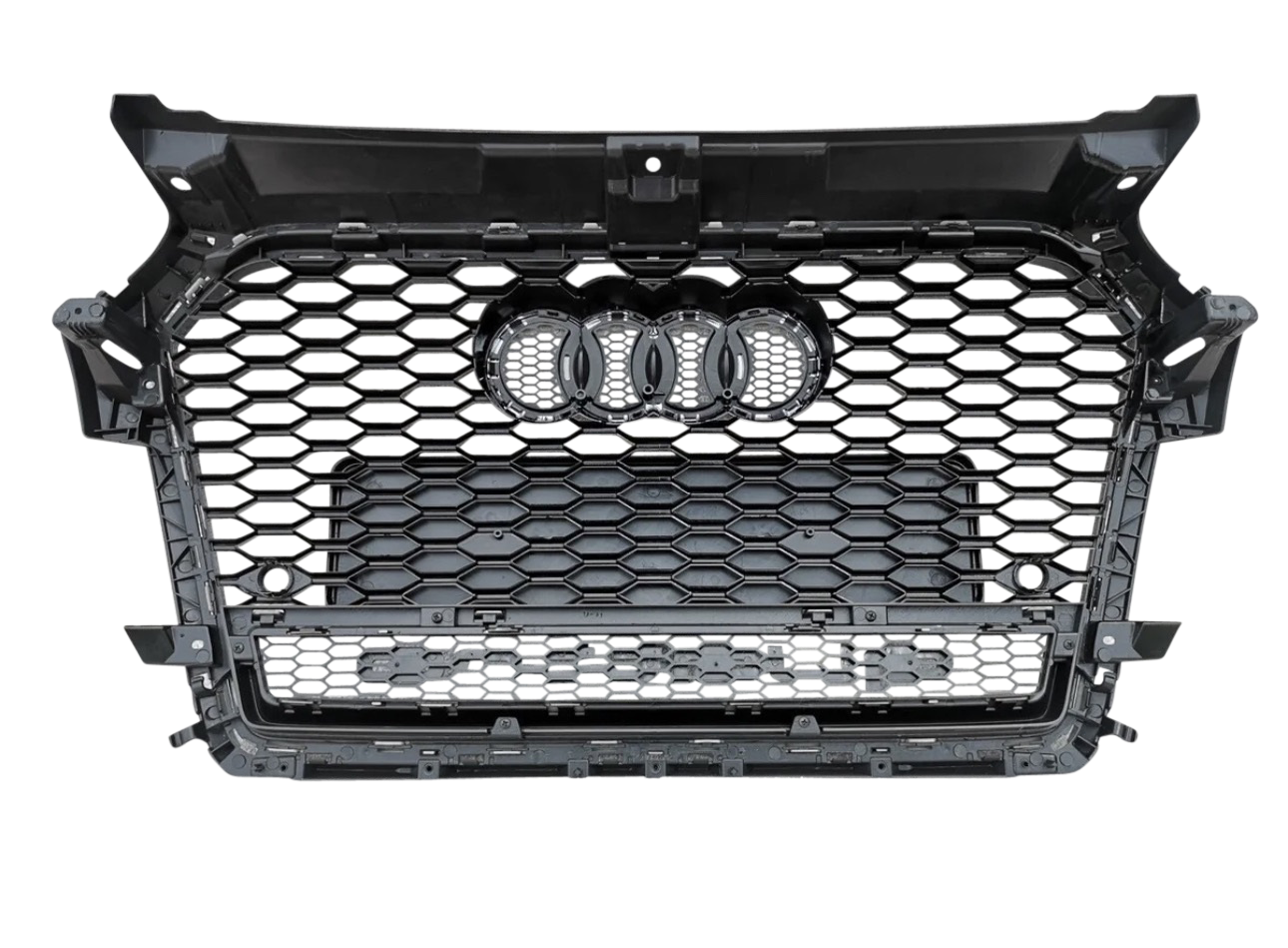 A black hexagonal-patterned car grille displays four rings at the center, set against a gray, seamless background.