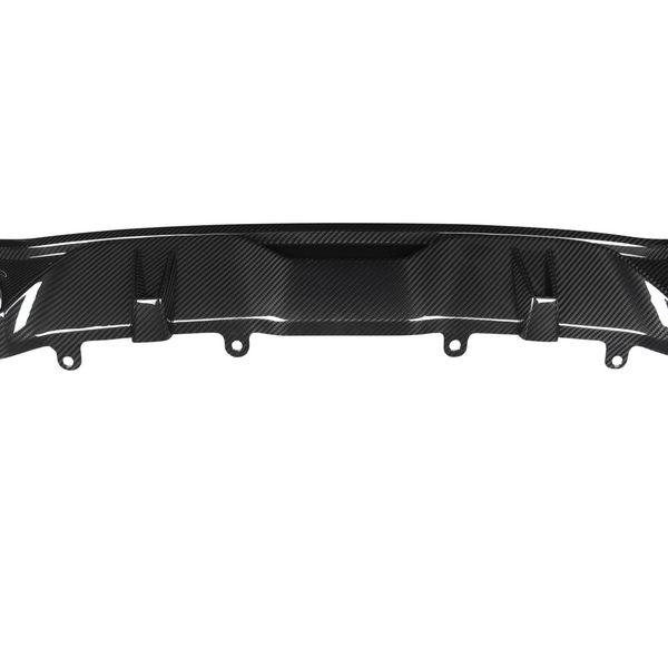 A carbon fiber rear diffuser with multiple fins is positioned horizontally, intended for aerodynamic improvement in a vehicle setting. The background is plain and white.