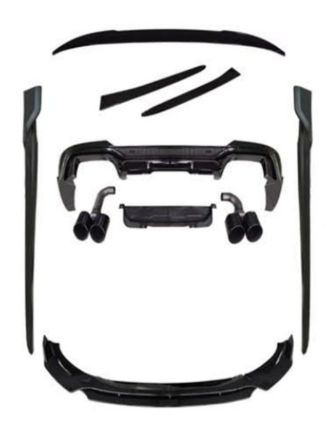 A set of black car body kit components, including bumpers, side skirts, and exhaust tips, are arranged on a white background, showcasing various parts for vehicle customization.
