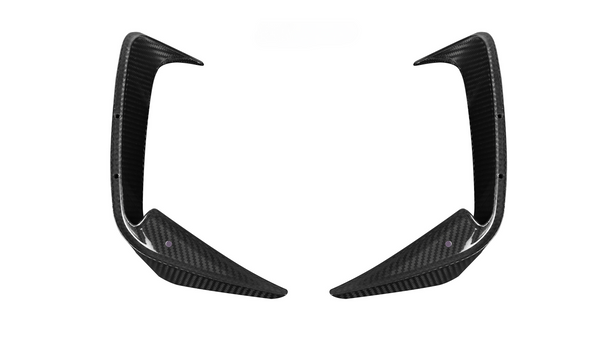 Two carbon fiber car aerodynamic fins pointing inward, set against a white background, with mounting holes visible along the edges.