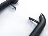Two curved black metal bars with mounting brackets are positioned on a glossy white surface, suggesting components for attachment or support in engineering or automotive applications.