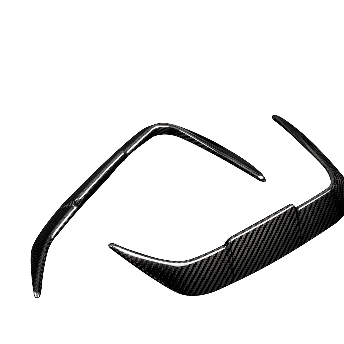 A pair of sleek, carbon fiber sunglass frames with pointed temples, positioned in a diagonal orientation against a plain white background.