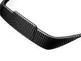 Curved, black carbon fiber car spoiler with a glossy finish; positioned against a white background, emphasizing its sleek, aerodynamic design.