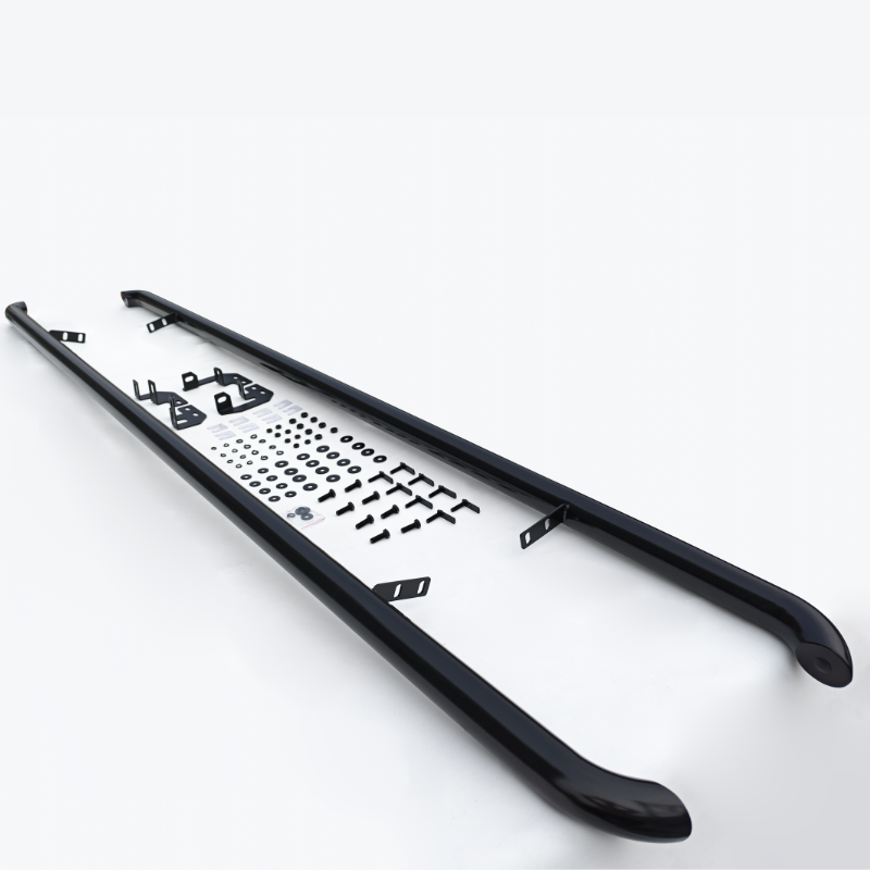 Two black metal roof rails rest on a white surface, accompanied by various mounting hardware, including brackets, screws, and washers, laid out in an organized manner.