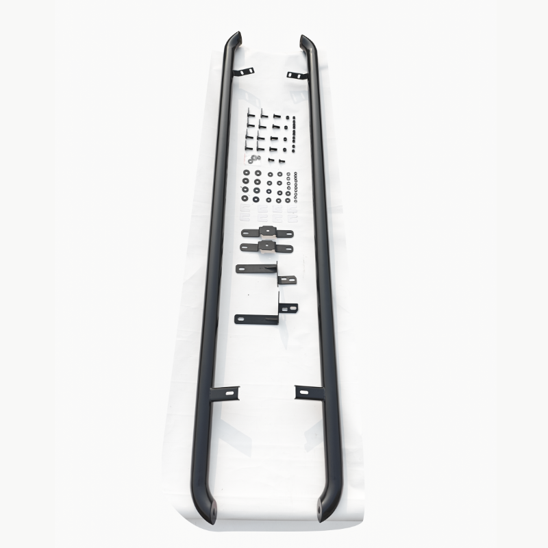 Two black metal bars are aligned parallel, surrounded by various small hardware components for assembly on a white surface.