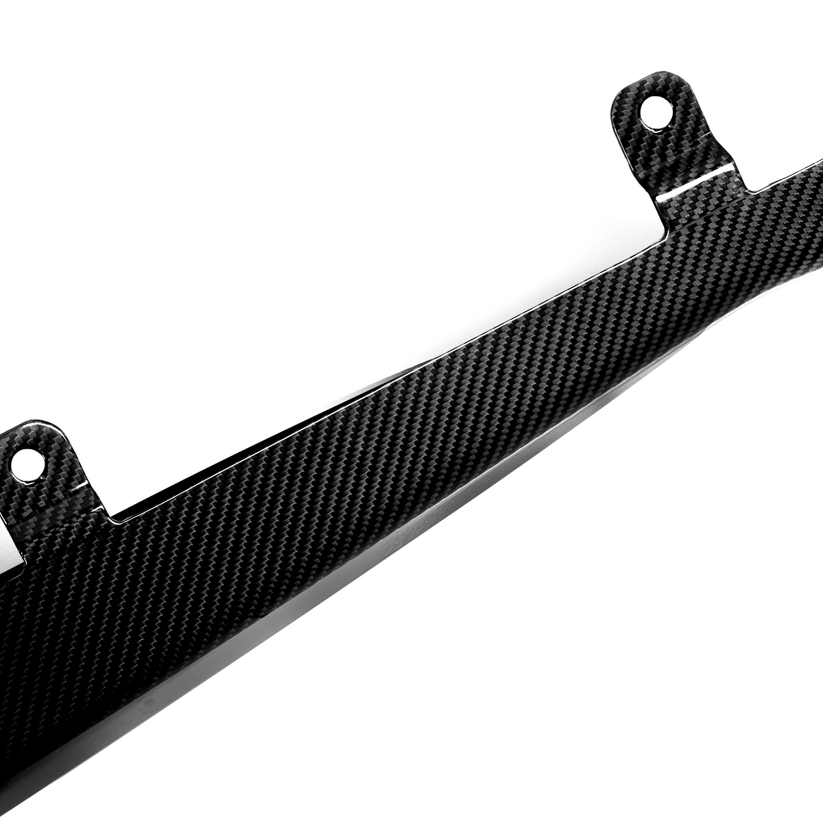 A carbon fiber component with two mounting holes, angled and shiny, rests against a white background, highlighting its sleek and lightweight design.