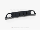A sleek black car rear diffuser with aerodynamic fins, oval cutouts at each end, displayed on a white background. Text: 