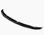 A sleek, black car spoiler with a smooth, curved design rests on a plain white background, highlighting its glossy finish and aerodynamic shape.