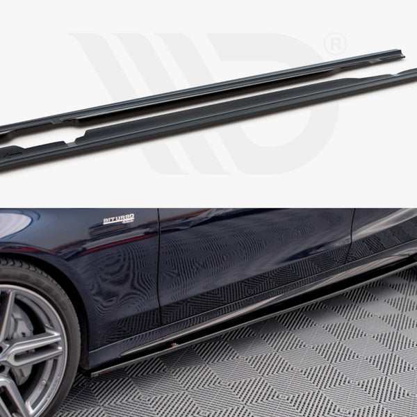 Two black side skirts are shown unattached above, with one attached to a dark car, parked on patterned flooring. The car has visible text "BITURBO" near the front wheel.