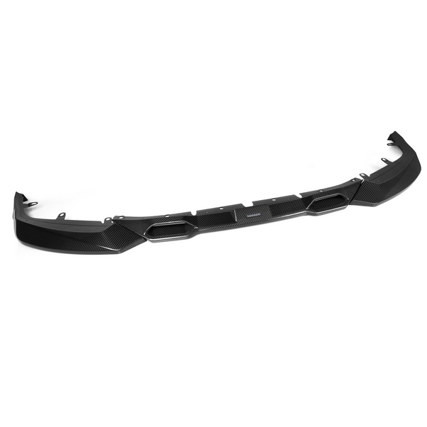 Carbon fiber car diffuser with a sleek, angular design. It features several slots and mounting points, set against a plain white background.