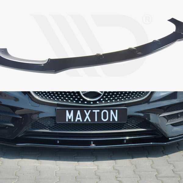 A black car front splitter is shown separately and attached to a sleek black car's bumper. The license plate reads "MAXTON," against a paved brick background.